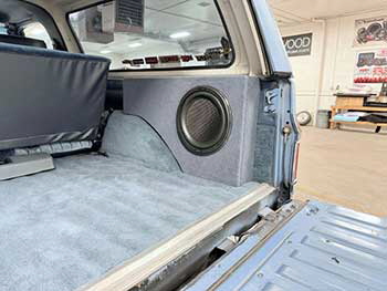 1980s Chevy Blazer with a nice audio upgrade. Custom kick panels for Kenwood speakers along with another paid in the rear side panels. Retro Autosound head unit and a custom side panel sub enclosure.