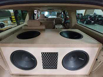 2007 Chevy Suburban. Installed Kenwood entertainment system, Rockford components up front and in the rear. Custom built huge 10 cubic foot enclosure that housed Rockford amps, and four 15" woofers with Rockford amps housed in the enclosure. Also installed Viper alarm remote start. This baby shook the ground!