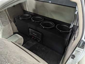 2002 GMC Sonoma in for a custom enclosure housing 4 Rockford Fosgate 10" subs driven by a Rockford Prime 1200.1 amp.