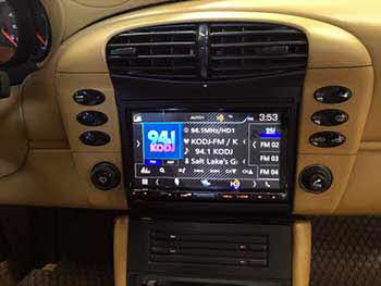 Porsche 911. Installed  a Kenwood 6.95" entertanment system with a custom dash cut. Also installed a Kenwood rear view camera.