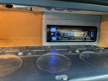 1964 Chevy Impala Convertible. Full custom build and install on this immaculate restored car. Equipment used: Rockford Fosgate amplifiers, components and speakers for the rear and Kenwood speakers for front channel. Kenwood stereo in custom built enclosure. 4 Rockford subs in trunk. MESA mat sound dampening all throughout vehicle as well s RGB lighting on interior and trunk.