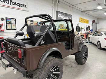 Restored CJ Jeep in for an audio upgrade. Installed Kenwood Bluetooth controller/hideaway unit  made custom speaker mounts for 5  Kenwood speakers in dash and a pair of Rockford Fosgate 6.5 can speakers on the rear toll bar.