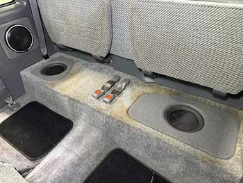 1993 Toyota pickup. Converted the rear floor cargo bins into sub enclosures for Kenwood woofers. Rear side pockets converted to hold Excelon speakers . Hertz 4 speakers up front. All powered by a 5-channel amp.