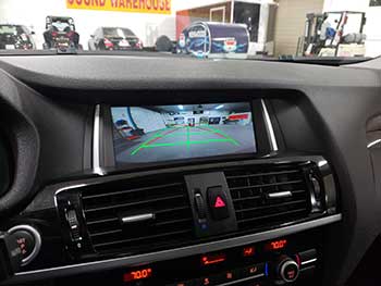 2017 BMW X3 - We added a Kenwood back up camera with a NAV-TV integration module to the OEM system. Works 100% like stock with distance lines & trajectory