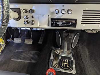 Fully restored 1967 Ford Bronco in for an audio upgrade. Installed Hertz 5-channel amp, made a custom center console to house Kenwood Excelon speakers, cut and strung Kenwood 7" speakers in rear side panels and added a downfire Kenwood Excelon 10" sub.