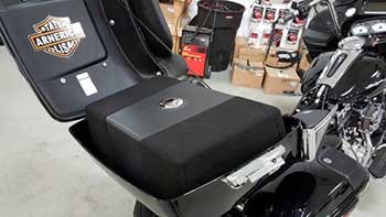 2015 Harley Road Glide.  Installed Rockford Fosgate: 2 pair marine speakers, 1 pair power 6" coax, 3 amps, 1 XS battery and 2 Kenwood  10" subs.   Custom built down fire sub box and trim panels for amps & battery in the bags.