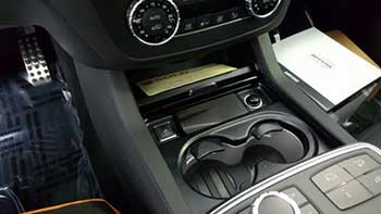 2015 Mercedes GL63 AMG. Installed Escort Passport along with mid city engineering c.a.n. interface. ABS formed and wrapped in black suede the controller and display into the ashtray opening.