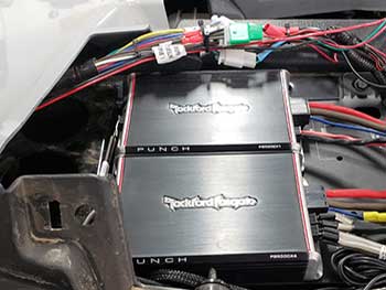 Installed a Rockford Fosgate Stage 3 Kit with a AM/FM hideaway antenna in this Polaris RZR Turbo.