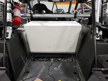 2017 Polaris RZR Turbo. We custom built a downfire vented enclosure for the cargo area. It's 100% 1" thick plastic (no wood) and is bed lined and mounted to the RZR. It has a custom grill for the vent pass through to the back seat. RZR already has a Rockford Fosgate Stage 5 kit. This upgrade gave the RZR a nice rich deep bass.