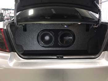 2011 Subaru WRX. Installed Kenwood CD receiver with Bluetooth, custom built enclosure for 2 Kenwood subs, Kenwood amp mounted under drivers seat with 6 1/2" component speaker system in the front and 6.75" coaxial speakers in the rear.