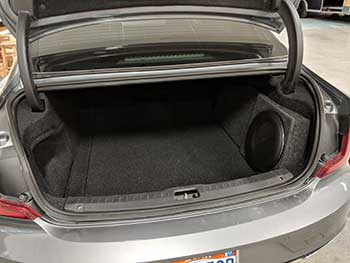 2017 Volvo S90. We custom built an enclosure to house a Kenwood Excelon 10� sub keeping the trunk functional and OEM looking. Also installed an Audio Control output converter and an Rockford Fosgate amplifier.